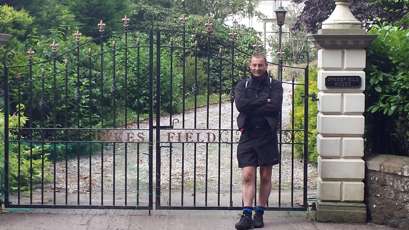 Lee... leaning of the gates of Dykesfield Manor House